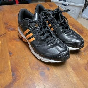 SIZE 10 ADIDAS - BLACK/ORANGE. WORN A COUPLE TIMES. IN GREAT CONDITION